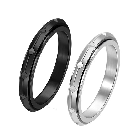 Textured spinner ring for focus in silver and black with raised geometric points