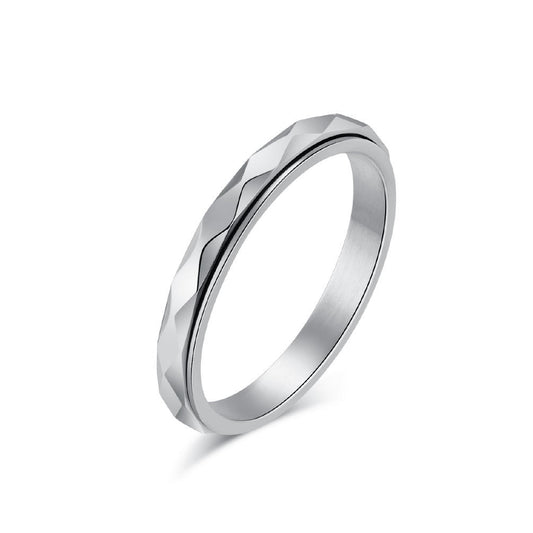 Silver stainless steel fidget ring with polished rippled outer band