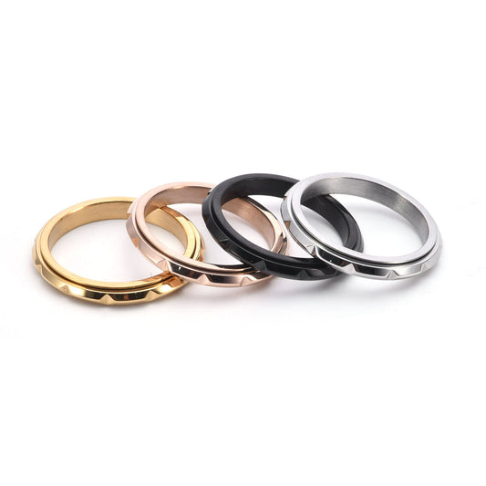 Textured fidget ring for focus in silver and black with raised geometric points