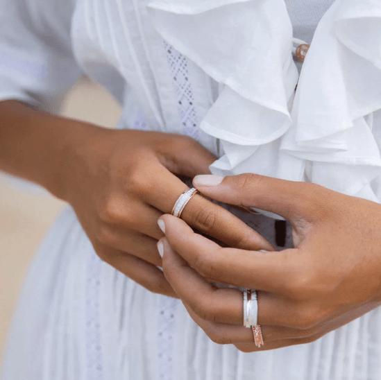 Wonder Sterling Silver and Gold Fidget Ring for Women with Rose Gold Edges and CZ Spinning Band – A feminine meditation ring designed for elegance, mindfulness, and tranquility.