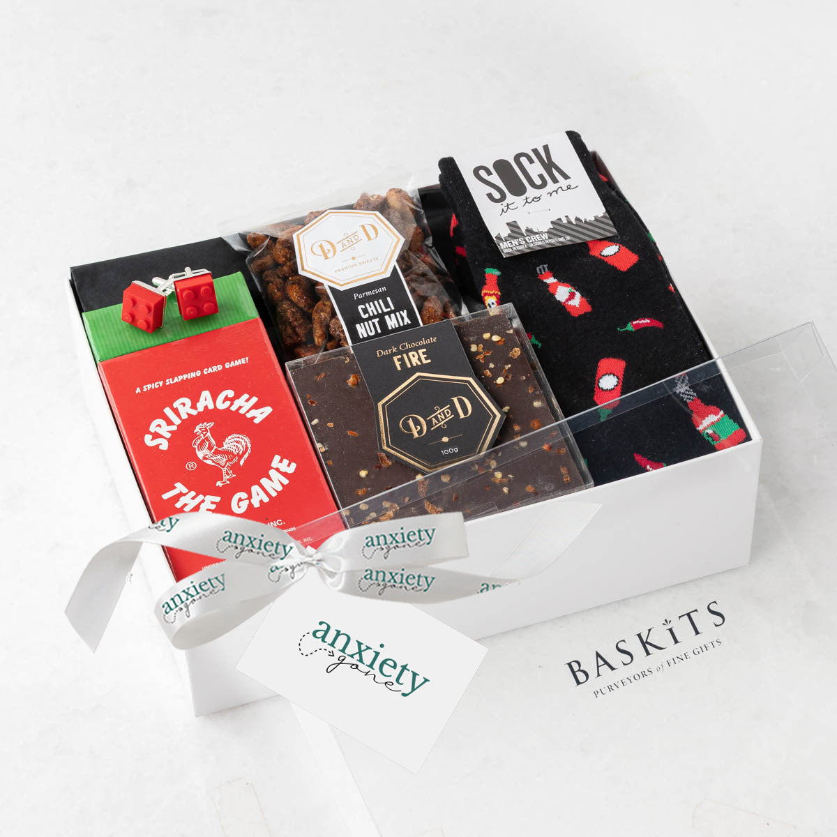 spicy gift set, hot sauce gift set, hot stuff gift box, spicy snacks gift basket, gift box for spice lovers, gourmet hot sauce gift set, spicy food gift basket, hot sauce & snacks gift set, unique gift basket for men, gift box for hot sauce fans, spicy gift basket canada, hot gift set for foodies, hot sauce gift basket canada, spicy treats gift box, novelty gift set spicy snacks