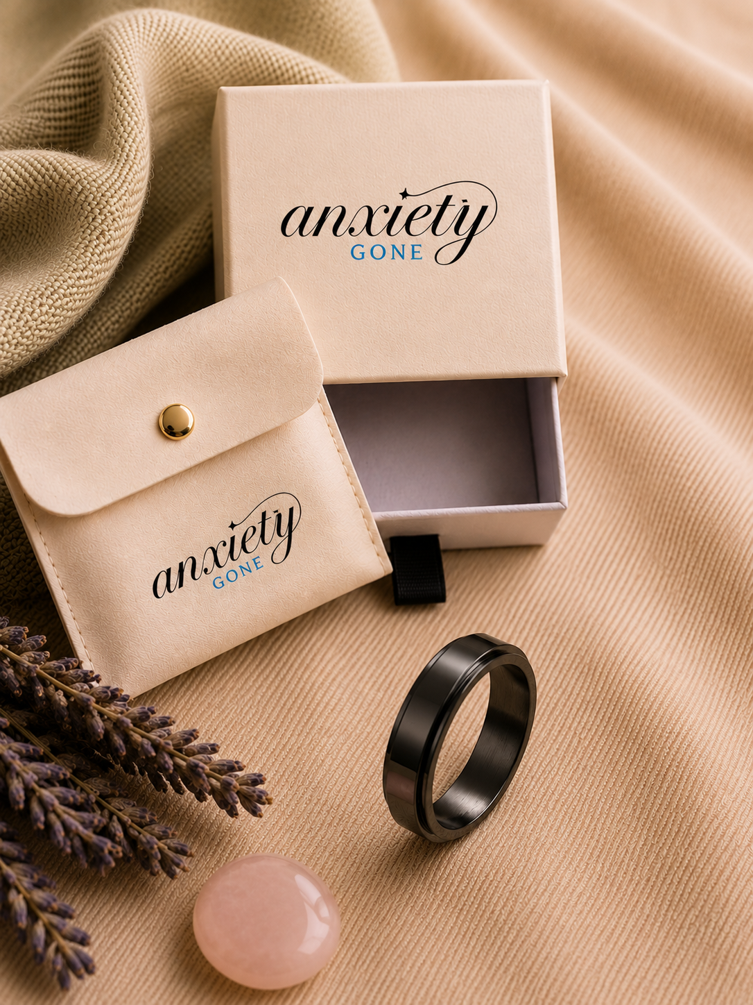 Flux Polished Band Spinner Ring displayed with its Anxiety Gone gift box and pouch