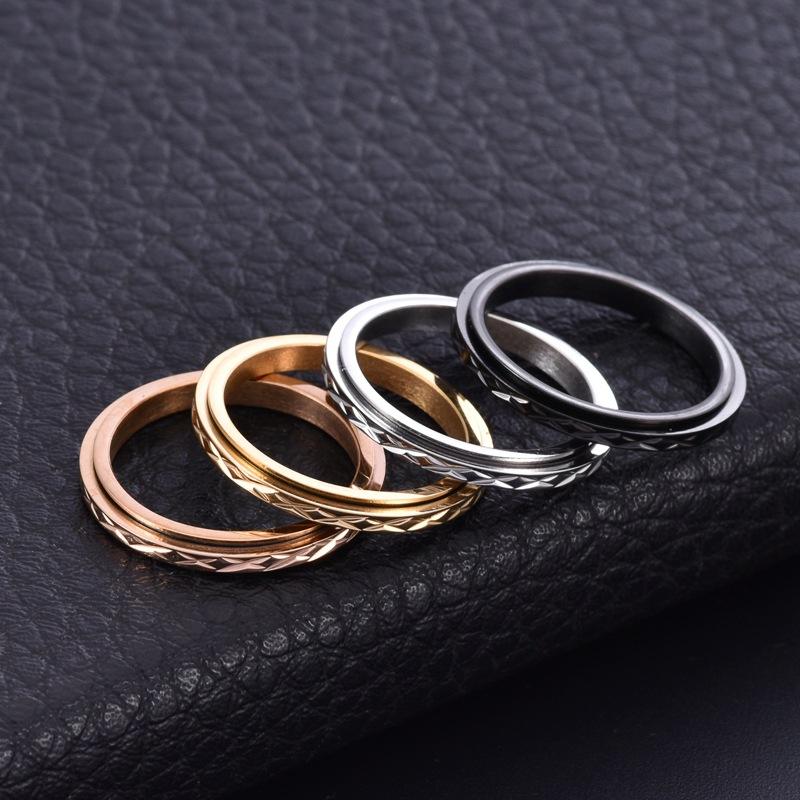 Chic fidget ring in silver, gold, black and rose gold finishes side by side