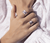 Sterling Silver Spinner Ring with hand-crafted organic leaf pattern and Yellow Gold spinning band, displayed with complimentary MeditationRings Tin and Travel Pouch
