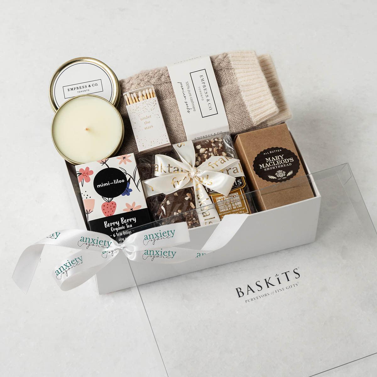Simply the Best Gift Box featuring luxurious self-care items like milk chocolate, shortbread cookies, a scented candle, cashmere socks, and more—ideal for self-care gifts, thank you gift baskets, and mental health gifts.
