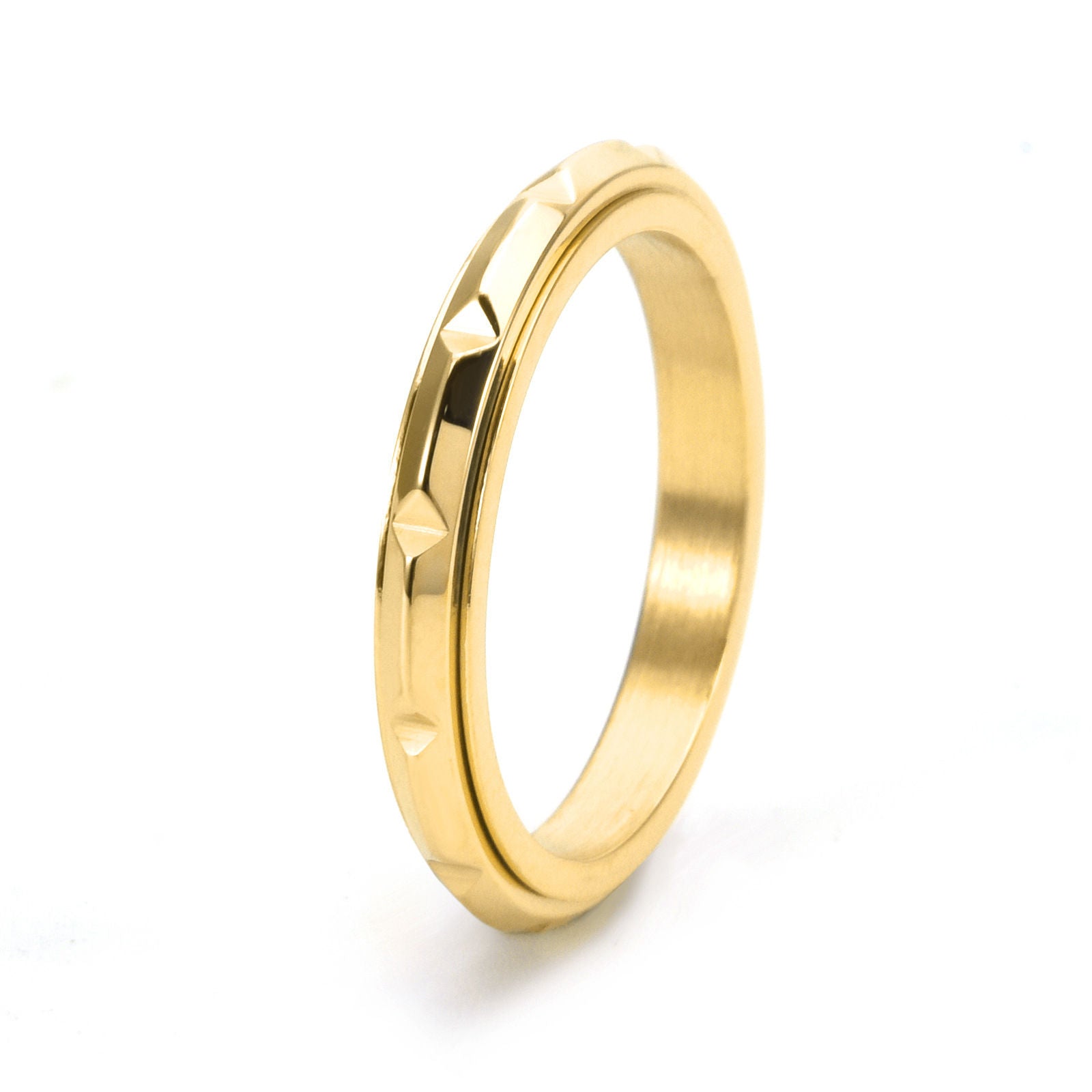 Gold Anchor fidget ring angled to show slim 3mm profile and textured band