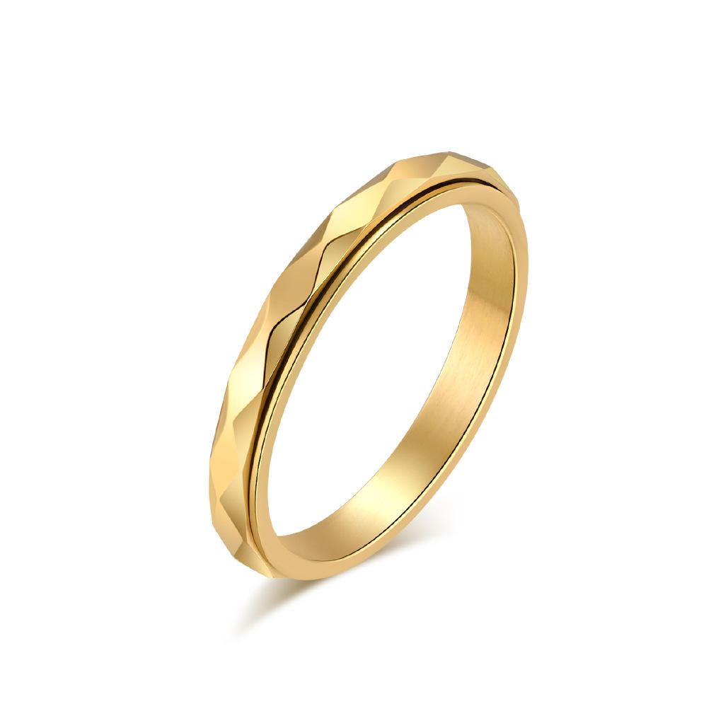 Gold Calm Wave fidget ring angled to show slim 3mm profile