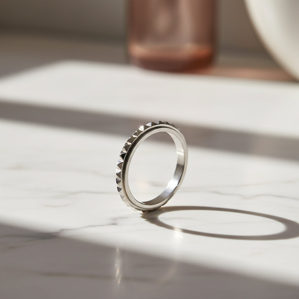 fidget ring, anxiety ring, spinner ring, worry ring, fidget jewelry, fidget ring for anxiety, spinning anxiety ring, anti-anxiety ring, stress relief ring, fidget ring for stress, fidget ring for adults, fidget ring for kids, fidget ring for women, fidget ring for men, discreet fidget ring, fidget ring for focus, fidget ring for work, calming ring for anxiety, ring to reduce stress, mental health support jewelry, stainless steel fidget ring, sterling silver fidget ring, gold spinner ring, minimalist fidget 