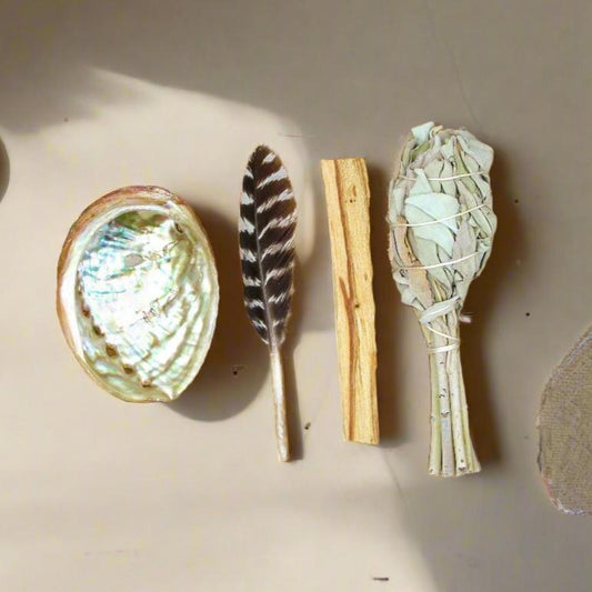 Beginner's Mini Smudging Kit with abalone shell, smudge stick, palo santo, and feather for energy cleansing, spiritual healing, and anxiety relief