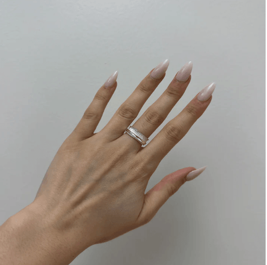 Sterling Silver Brushed & Shiny Textured Anxiety Ring with spinning band, displayed with complimentary MeditationRings Tin and Travel Pouch