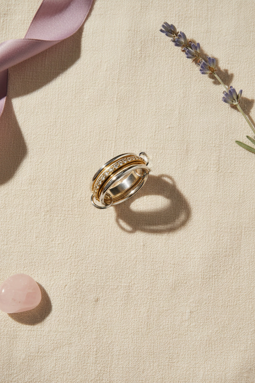 Mixed metal meditation ring with gold and silver linked bands