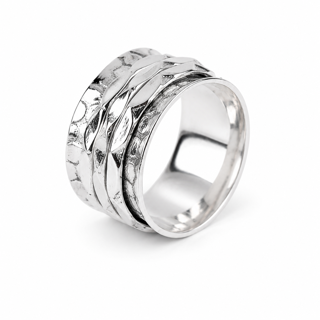 A silver spinner ring with a textured, overlapping band design, shown on a clean white background.