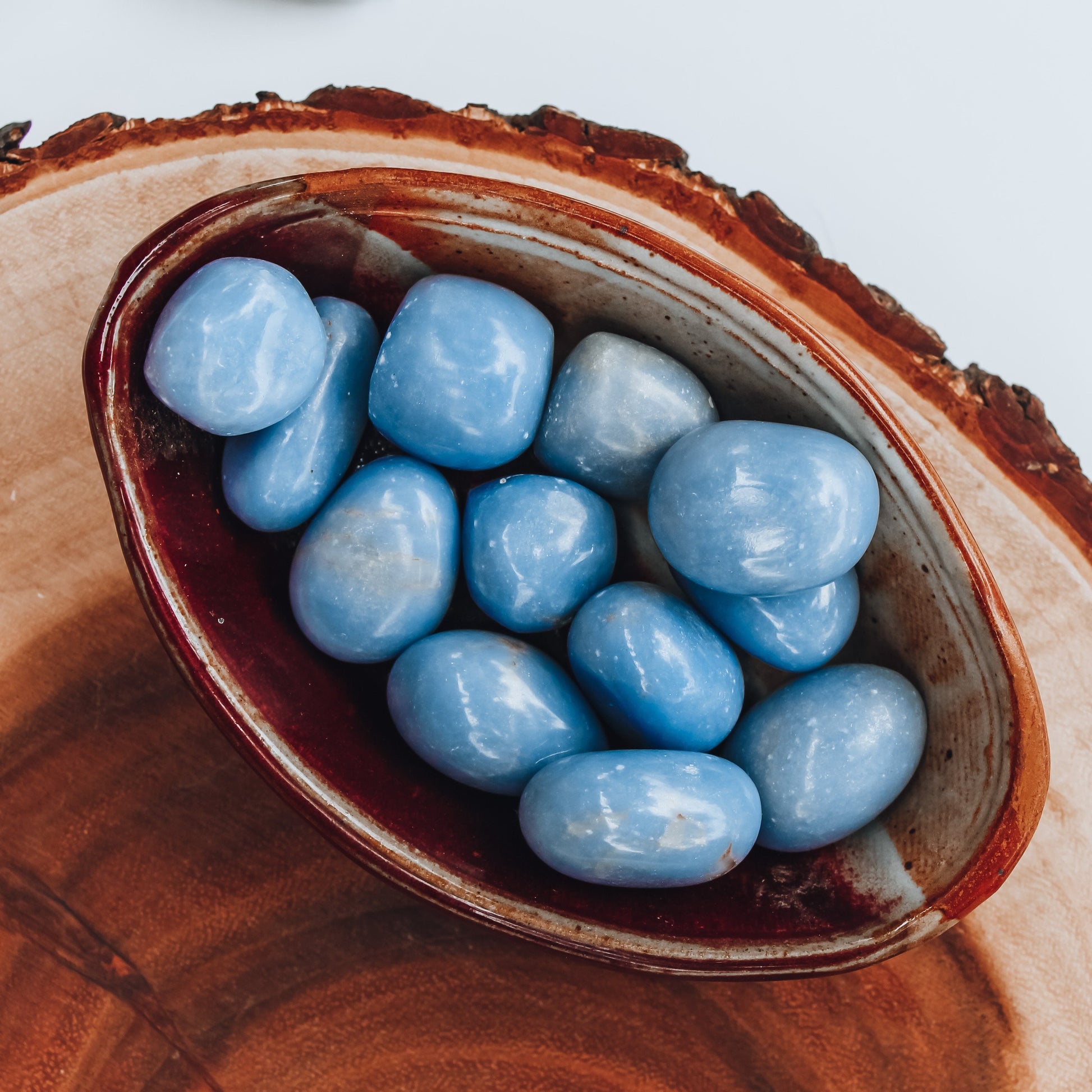 Angelite Tumbled Stone 1 inch, polished blue healing crystal for peace and anxiety relief, calming angelite gemstone for stress and emotional healing, natural angelite pocket stone for meditation and mindfulness, angelite crystal for compassion and clear communication, genuine angelite stone for spiritual growth and angel connection, tumbled gemstone for self-care and chakra healing, angelite crystal gift for women and men