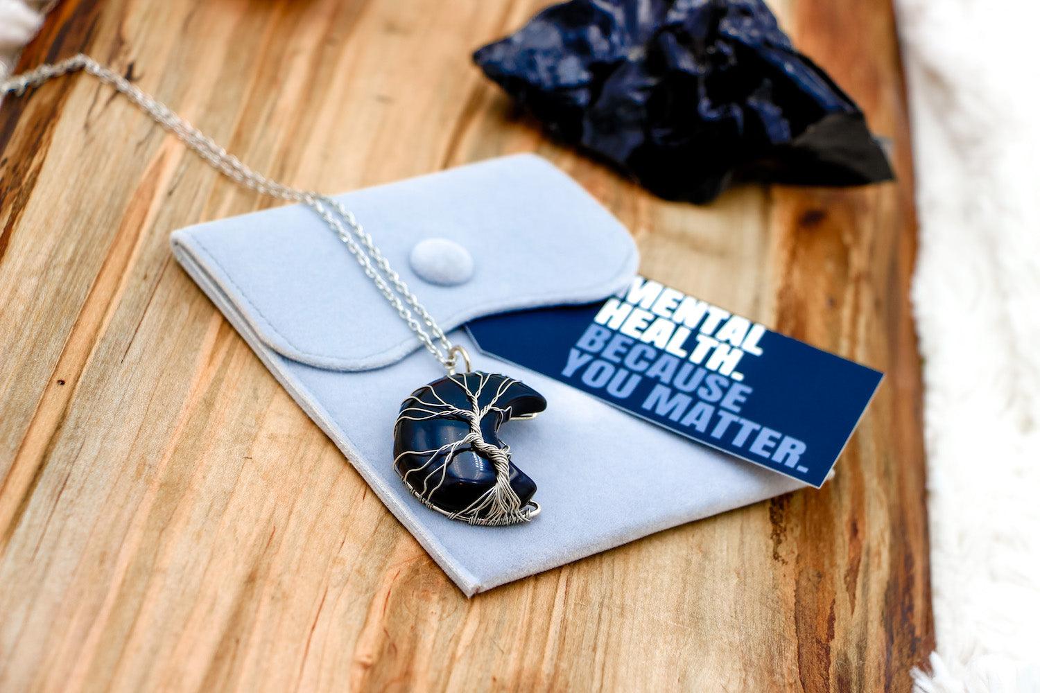 Grounding Black Obsidian Crescent Moon Gemstone Necklace for healing crystals, anxiety relief, and crystal healing stones.