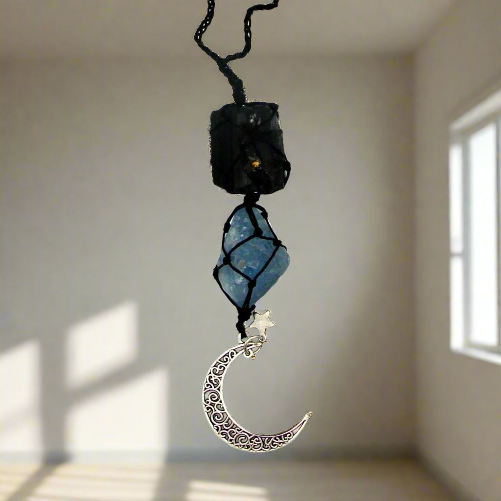 Peaceful Crescent Moon Gemstone Hanging Charm with black tourmaline and celestite, stones for anxiety and inner peace.