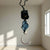 Peaceful Crescent Moon Gemstone Hanging Charm with black tourmaline and celestite, stones for anxiety and inner peace.