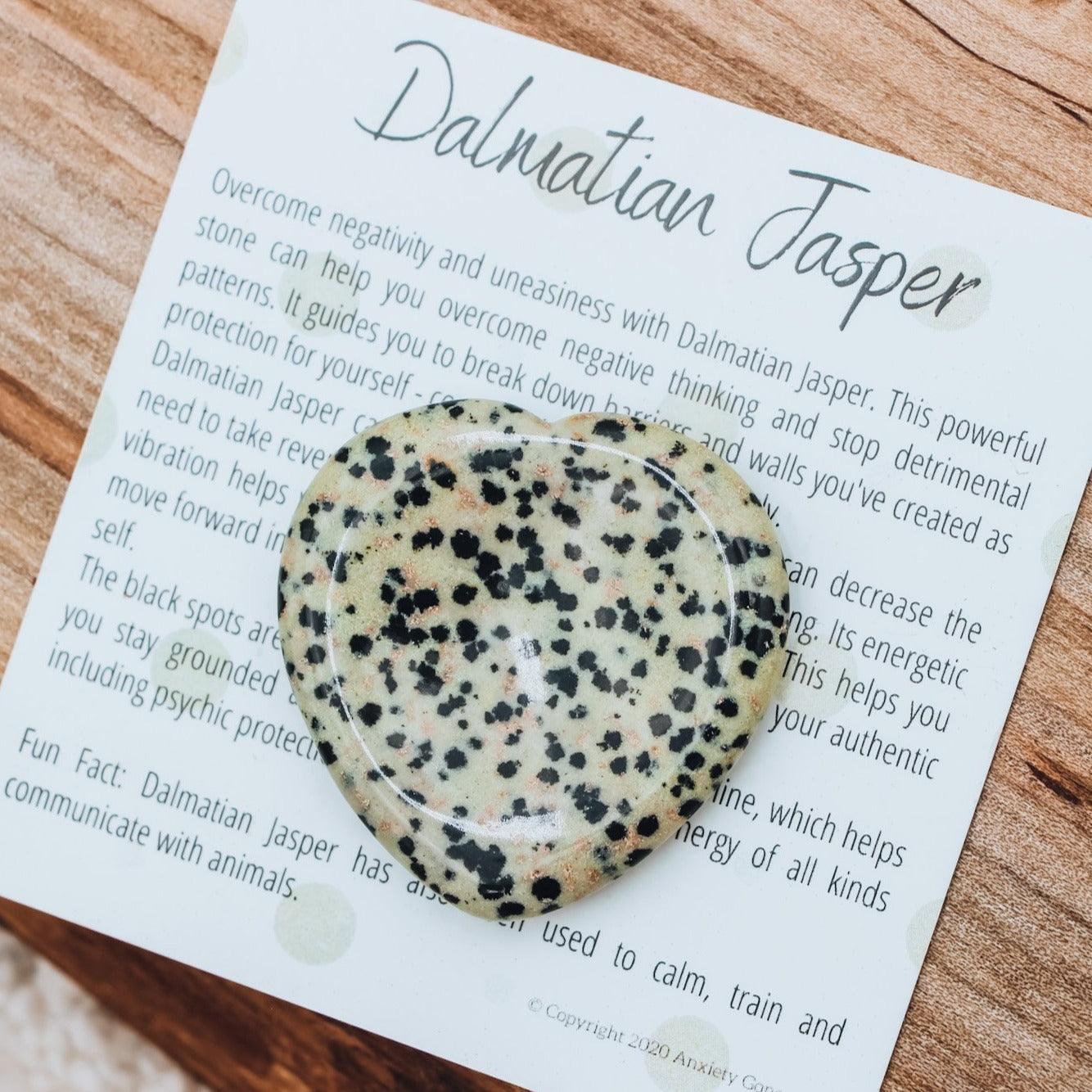 Dalmatian Jasper worry stone for anxiety relief, stress support, and grounding – natural thumb stone with Black Tourmaline inclusions and info card