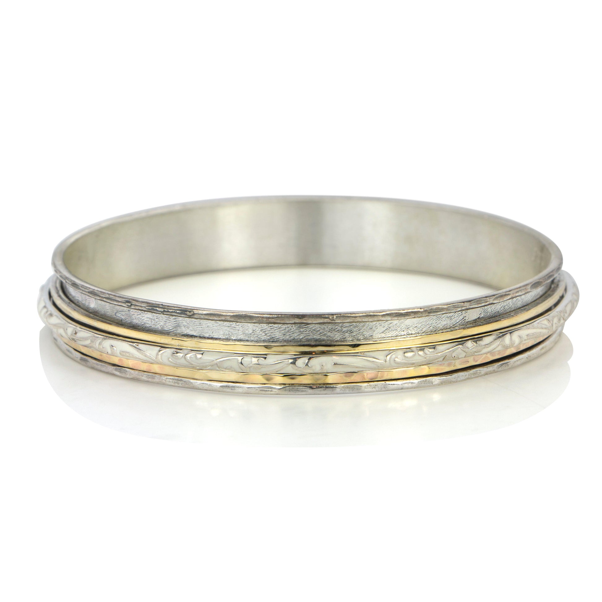 spinner rings,silver meditation rings, worry rings, adult spinner rings, spinner rings for adults, Tibetan meditation rings, Tibetan spinning ring, Tibetan worry rings, silver spinner rings, sterling silver spinner rings, silver and gold spinner rings, infinity ring, spinner rings Canada, meditation rings Canada, worry rings Canada, spinning ring canada, spinning anxiety ring, anxiety ring, spinning anxiety ring, spinning bracelet, anxiety bracelet,
